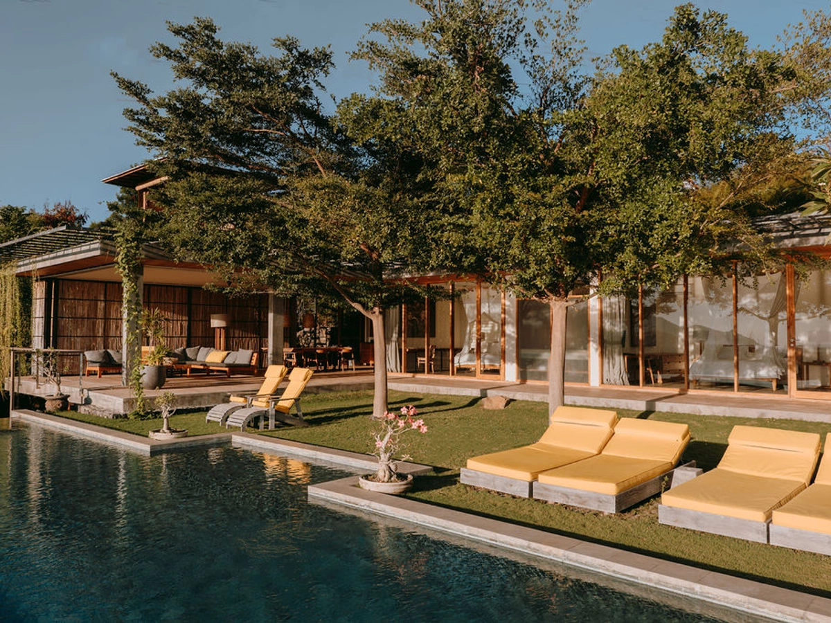 The villa, with pool and open garden pavilions